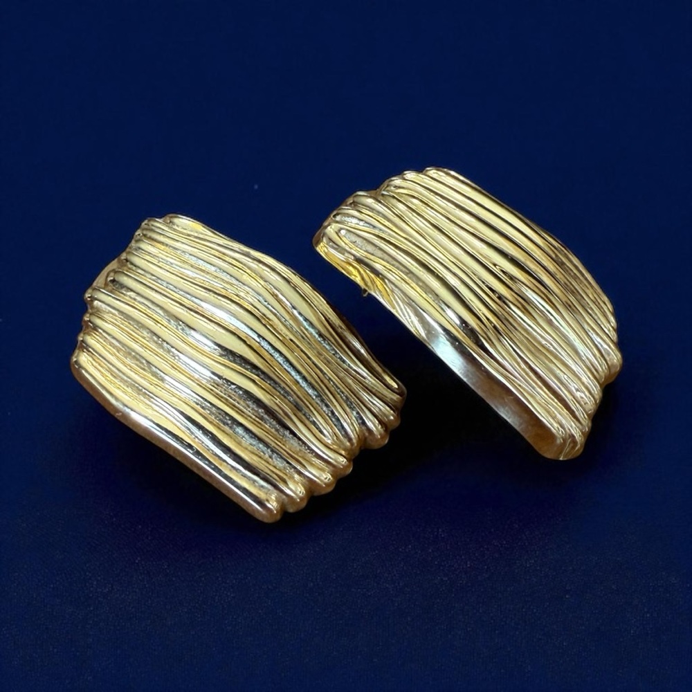Vintage chunky, statement earrings with a rich gold-toned finish.